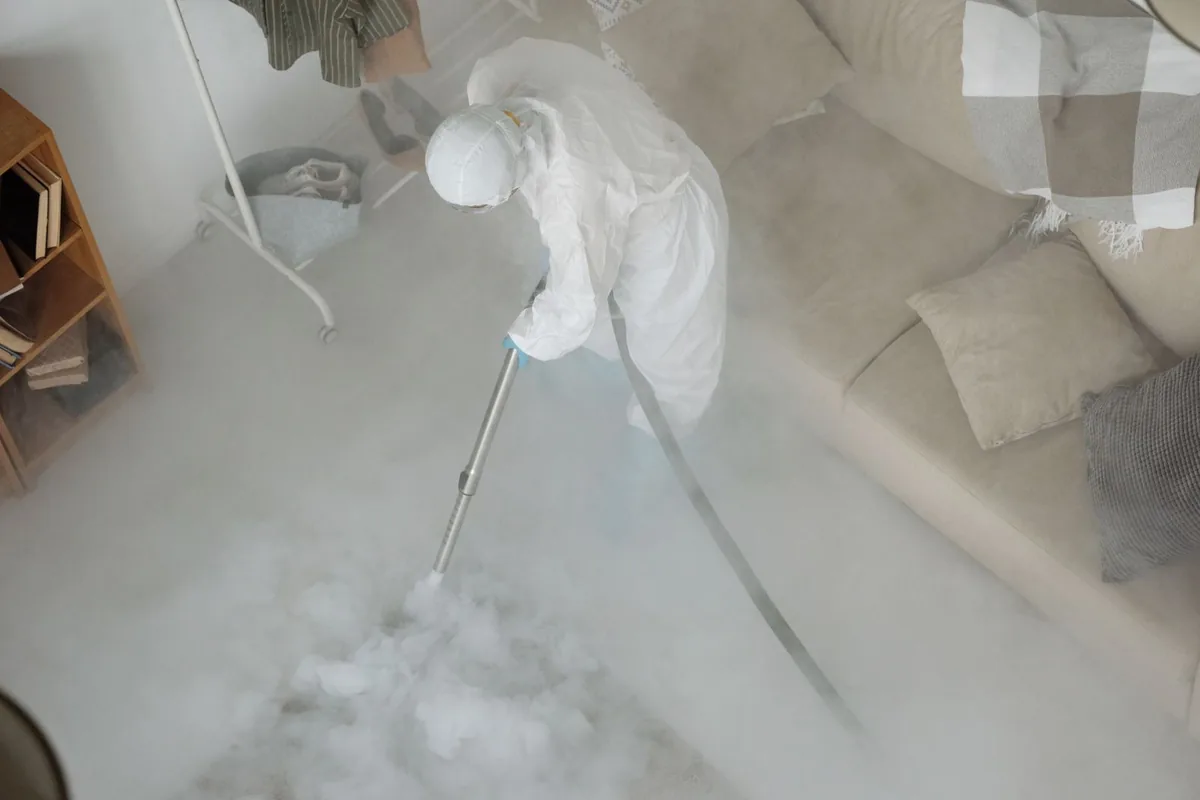 Biohazard cleanup technician in protective equipment, Winder, GA